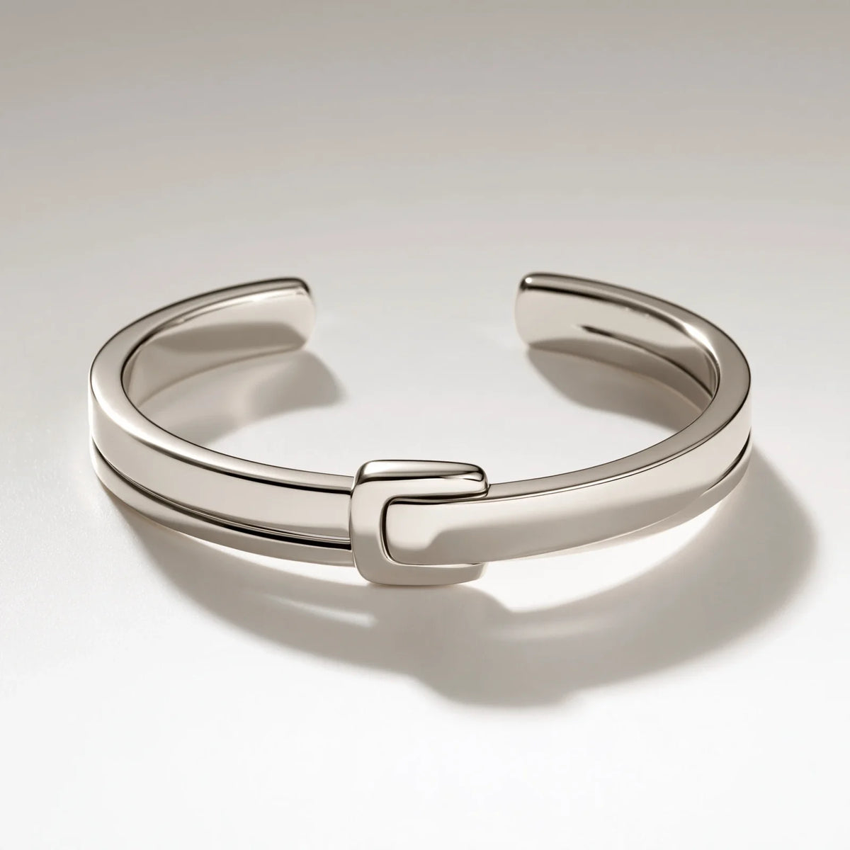 MAYA 01 Antibes open cuff in Polished Silver with a sculpted buckle across the band