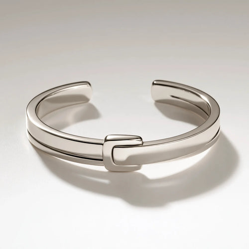 MAYA 01 Antibes open cuff in Polished Silver with a sculpted buckle across the band