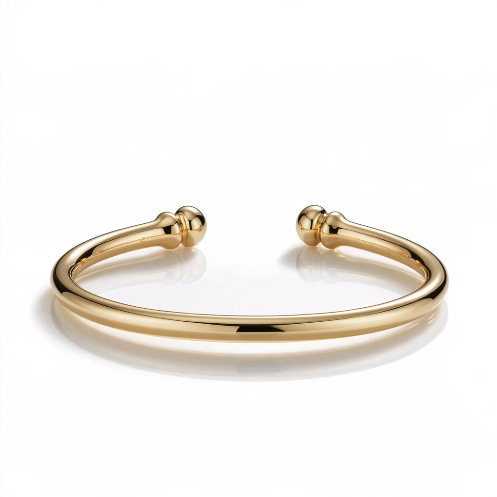 MAYA 01 Cap Ferrat polished gold open cuff with ball ends