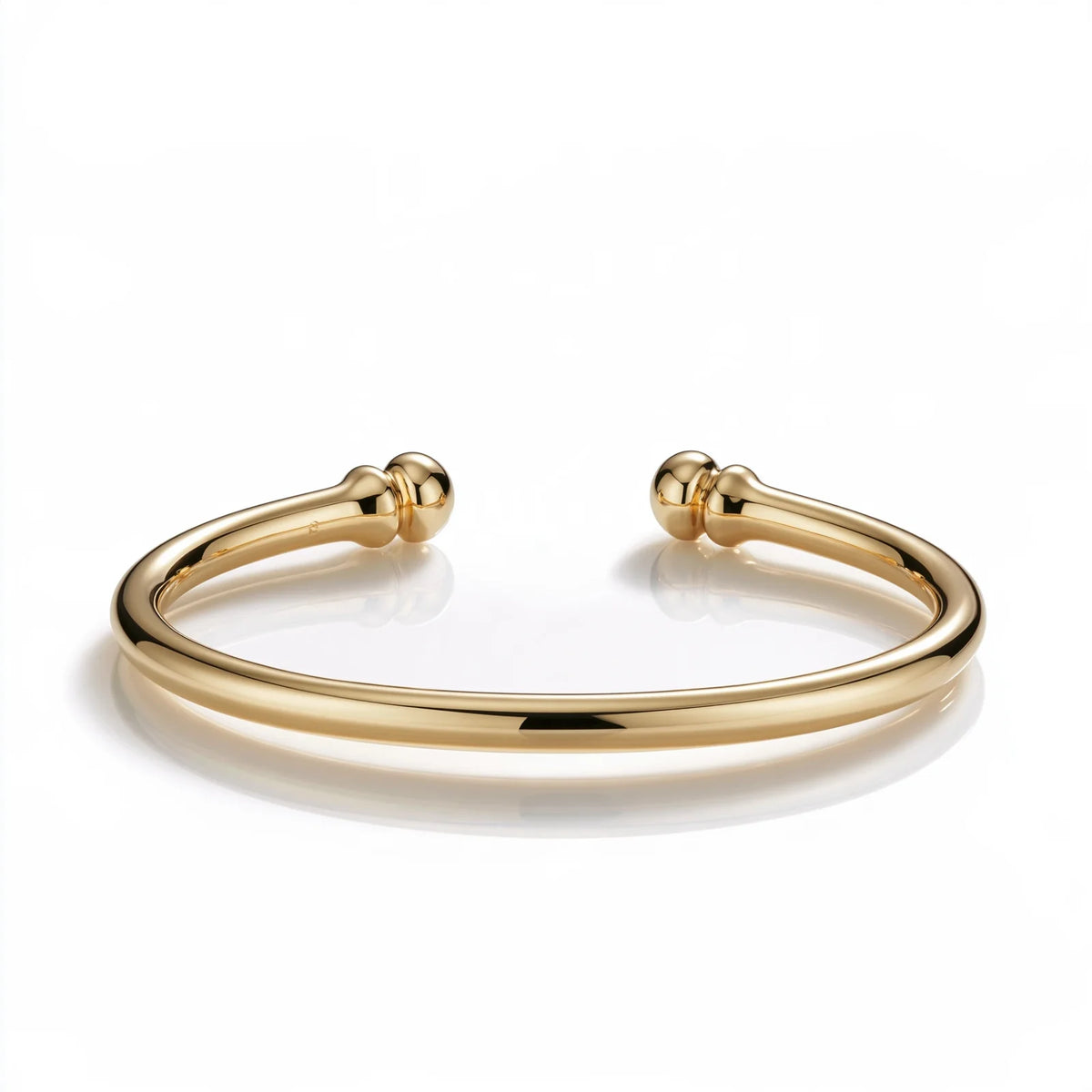 MAYA 01 Cap Ferrat polished gold open cuff with ball ends