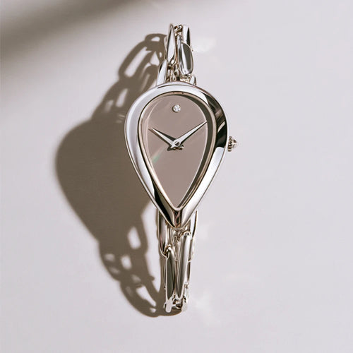 MAYA 01 Celeste silver teardrop watch with a taupe dial and a single stone at twelve