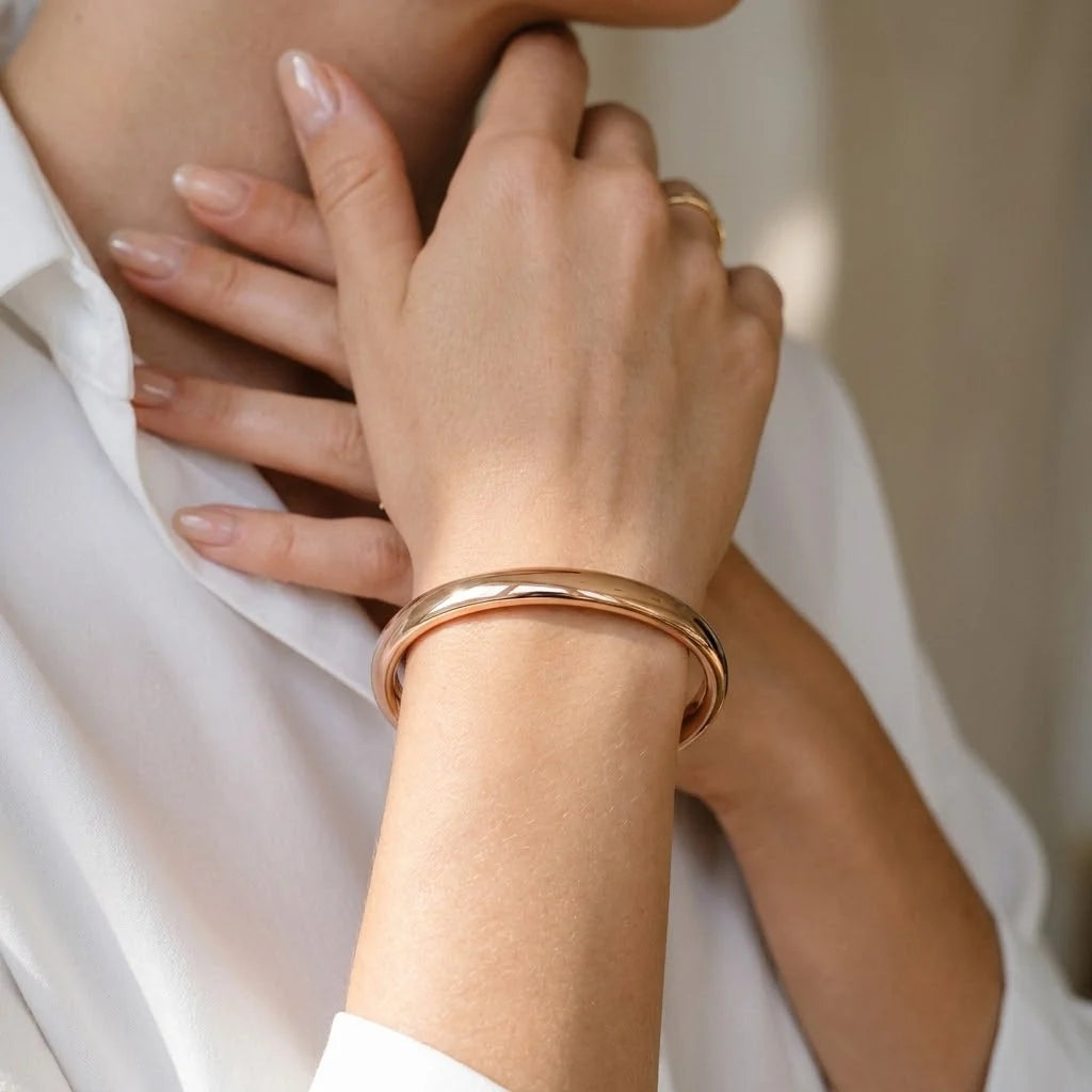 MAYA 01 Taormina cuff in Rose Gold worn with a crisp white shirt and gold rings